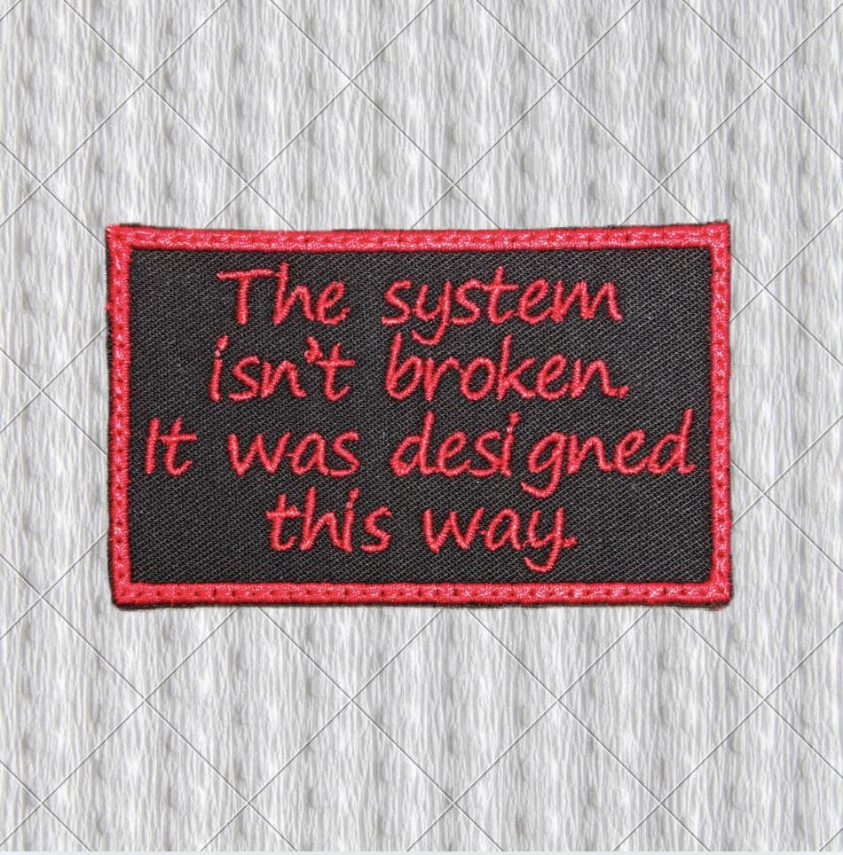 The System Isn't Broken Patch – Red Embroidery on Black Twill – Political Protest Patch
